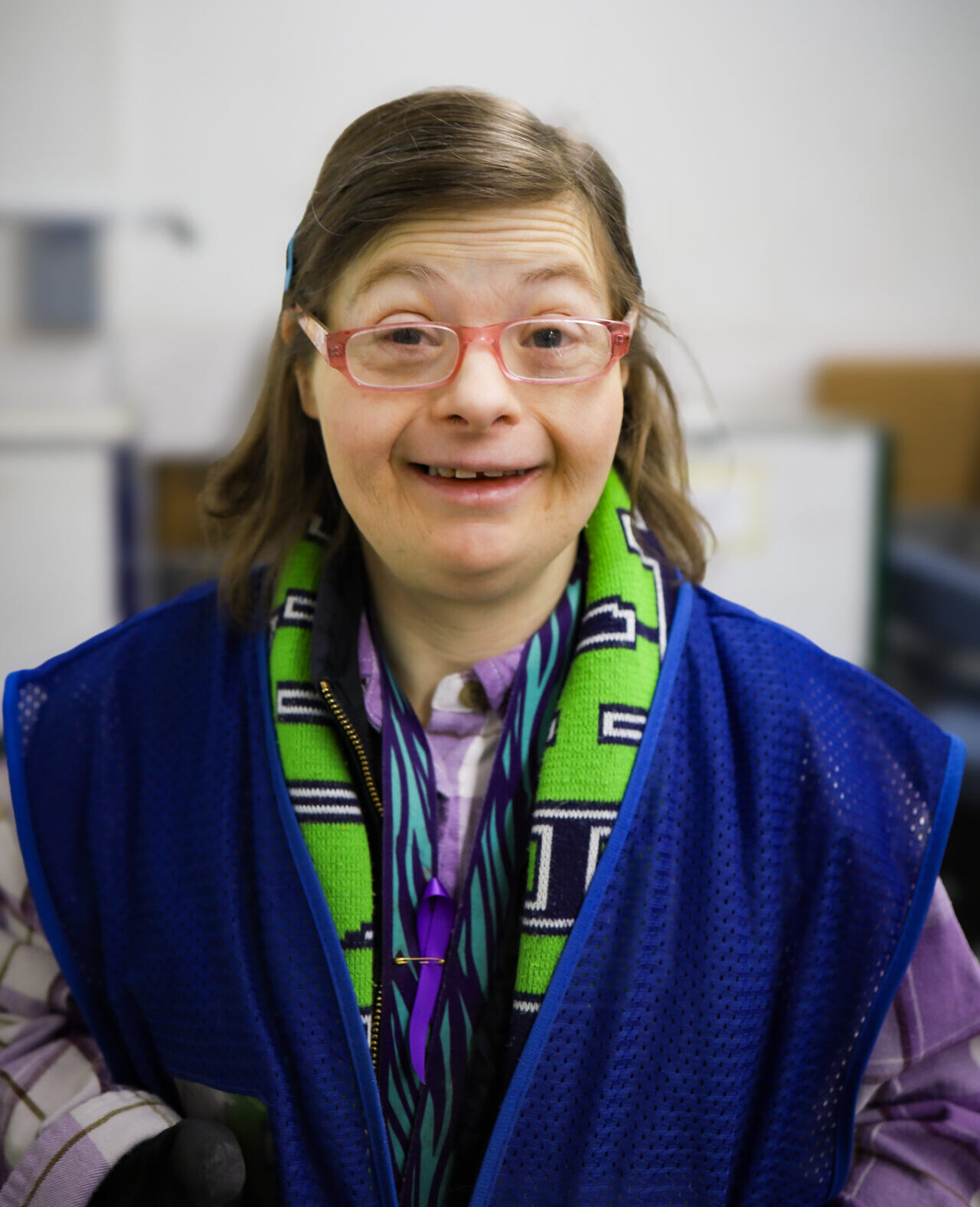 A woman is smiling at the camera